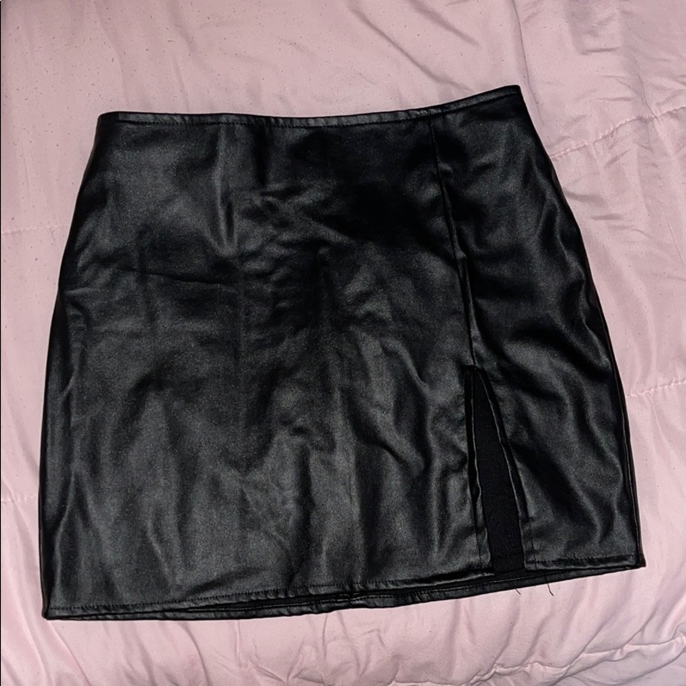 Black leather mini skirt